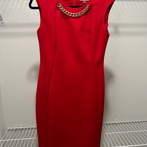 Elegant Red Dress with Chain Detail